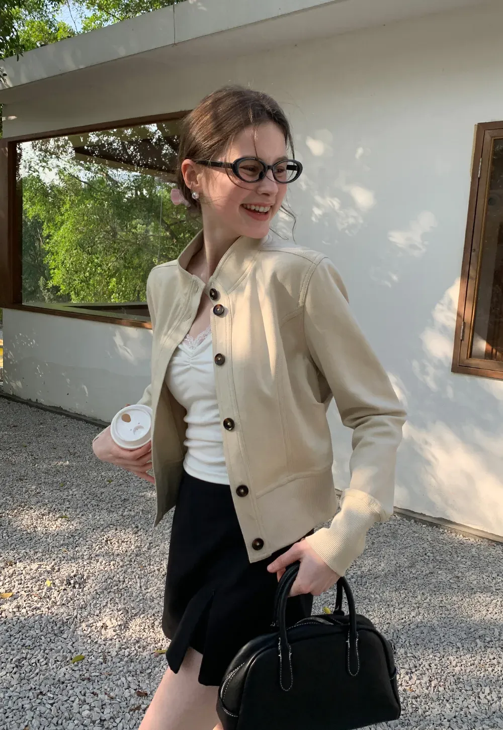 Short jacket with button front and ribbed cuffs