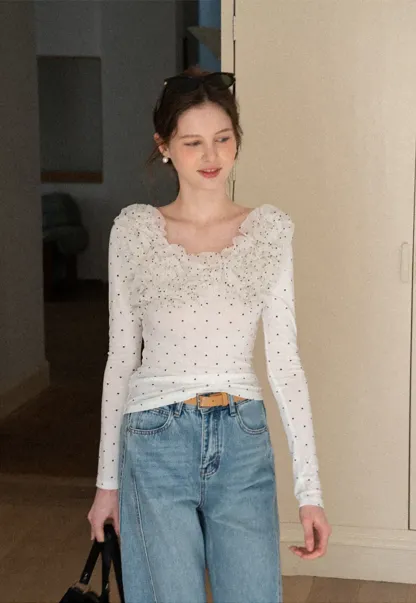 Polka dot long sleeve top with ruffled neckline