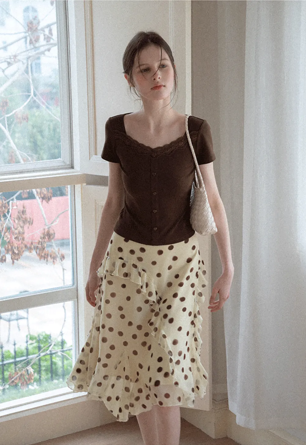 Polka dot ruffled asymmetrical midi skirt