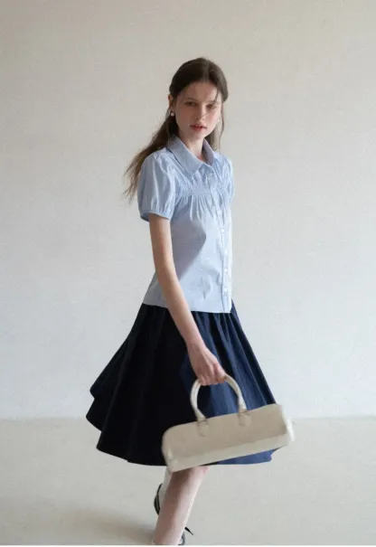 A-line pleated midi skirt with waistband