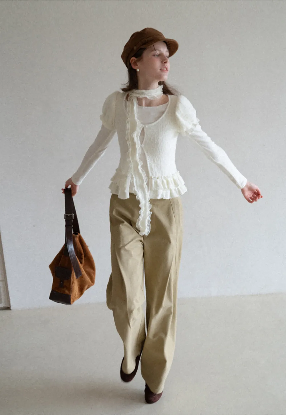 floral lace top with puffed sleeves and ruffled hem