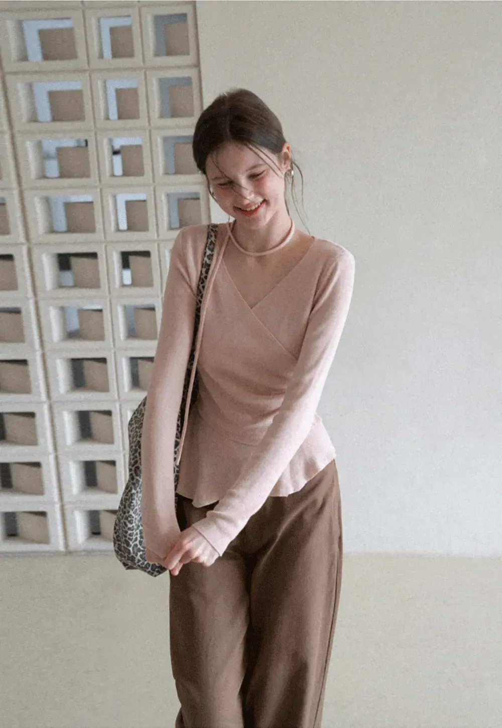 Long sleeve wrap knit sweater with ruched detail