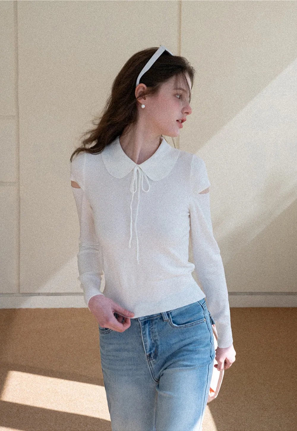 Elegant Knit Sweater with Bow Detail and Cutout Sleeves