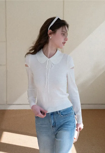 Elegant Knit Sweater with Bow Detail and Cutout Sleeves