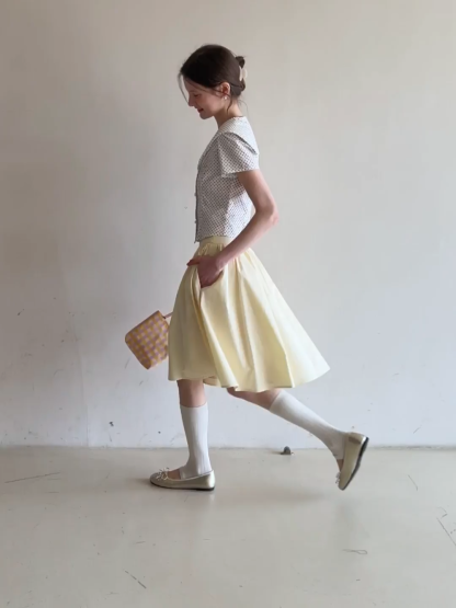 A-line pleated midi skirt with waistband