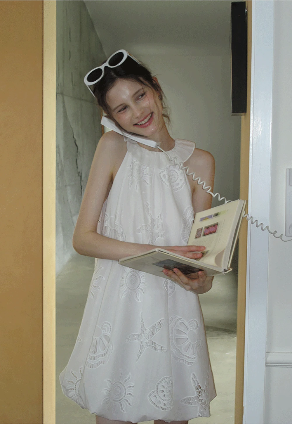 Women’s Sleeveless Eyelet Mini Dress with Ruffle Neck
