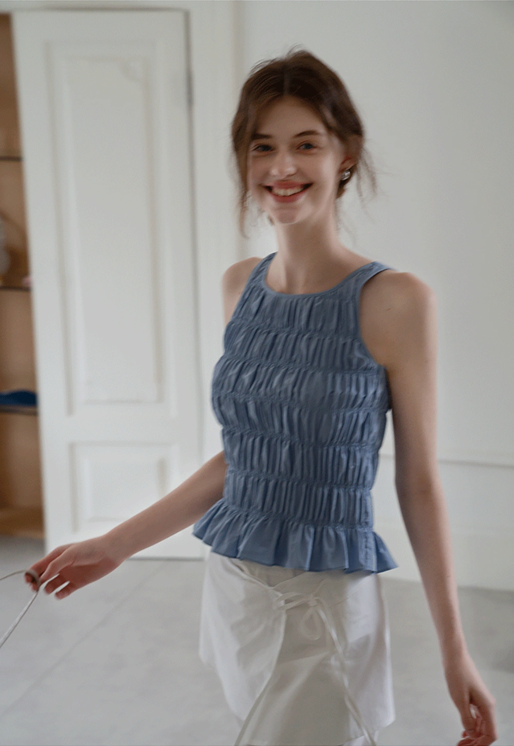 Women's Smocked Ruffle Hem Sleeveless Top