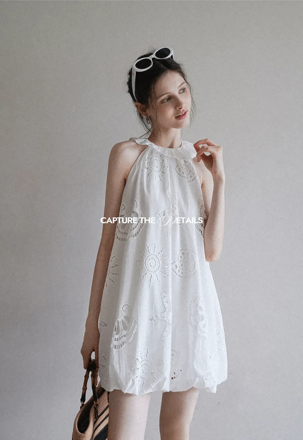 Women’s Sleeveless Eyelet Mini Dress with Ruffle Neck