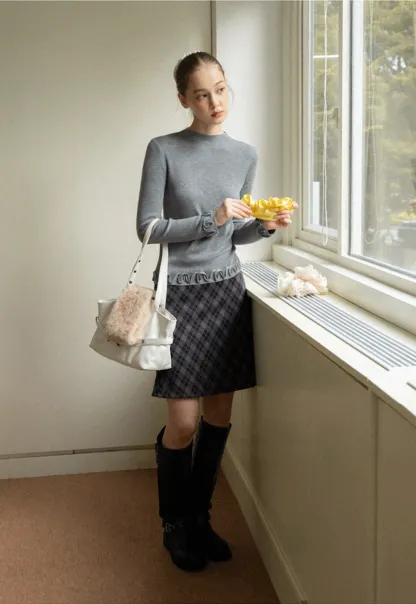 Chic Knit Sweater with Ruffle Edges