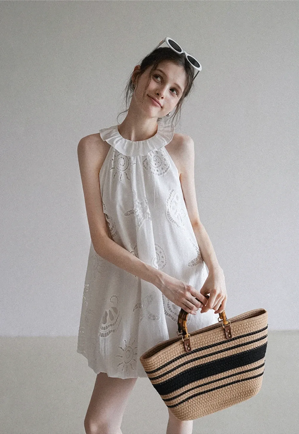 Women’s Sleeveless Eyelet Mini Dress with Ruffle Neck