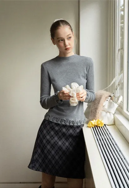 Chic Knit Sweater with Ruffle Edges