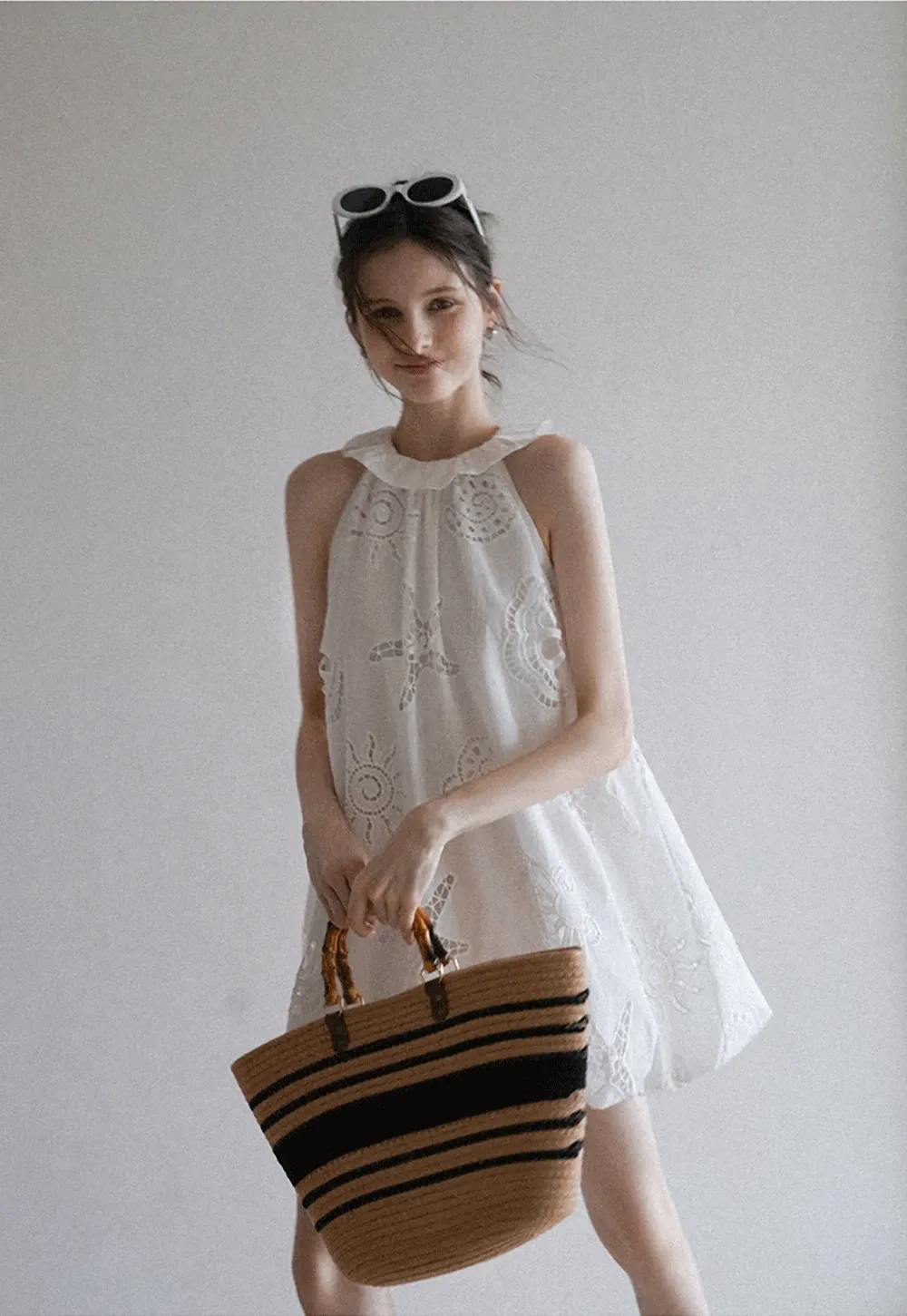 Women’s Sleeveless Eyelet Mini Dress with Ruffle Neck
