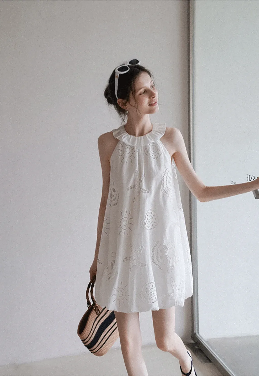 Women’s Sleeveless Eyelet Mini Dress with Ruffle Neck