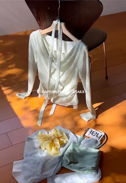 Long sleeve knit top with back tie detail