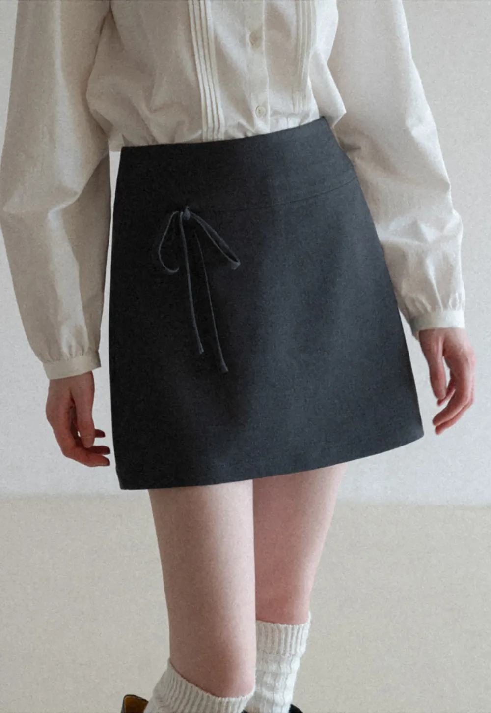 A-line mini skirt with front zipper closure