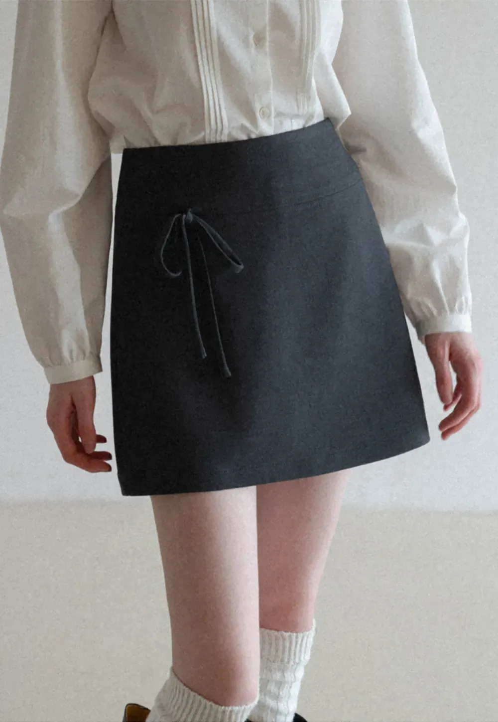 A-line mini skirt with front zipper closure