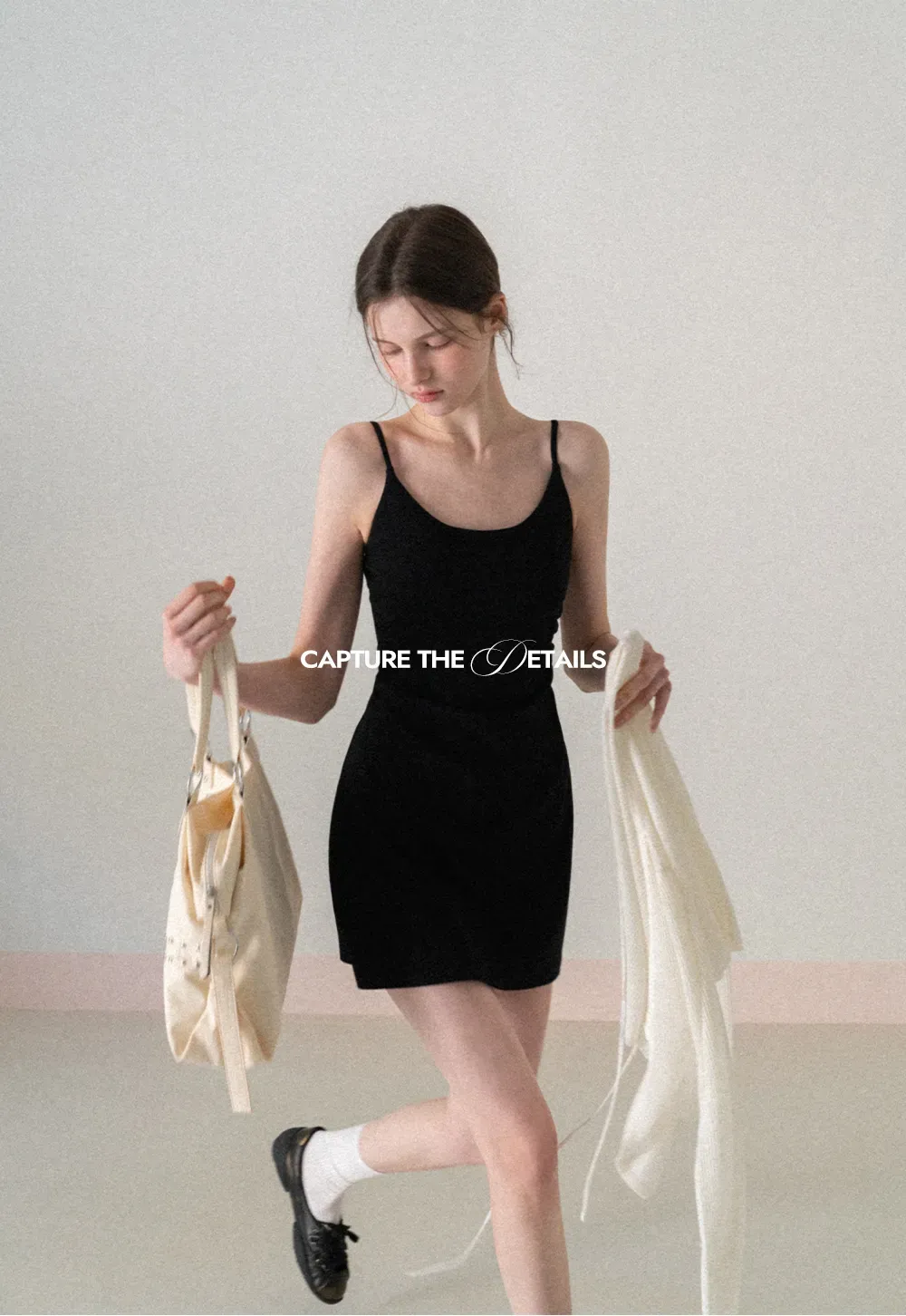 Sleeveless fitted mini dress with thin straps