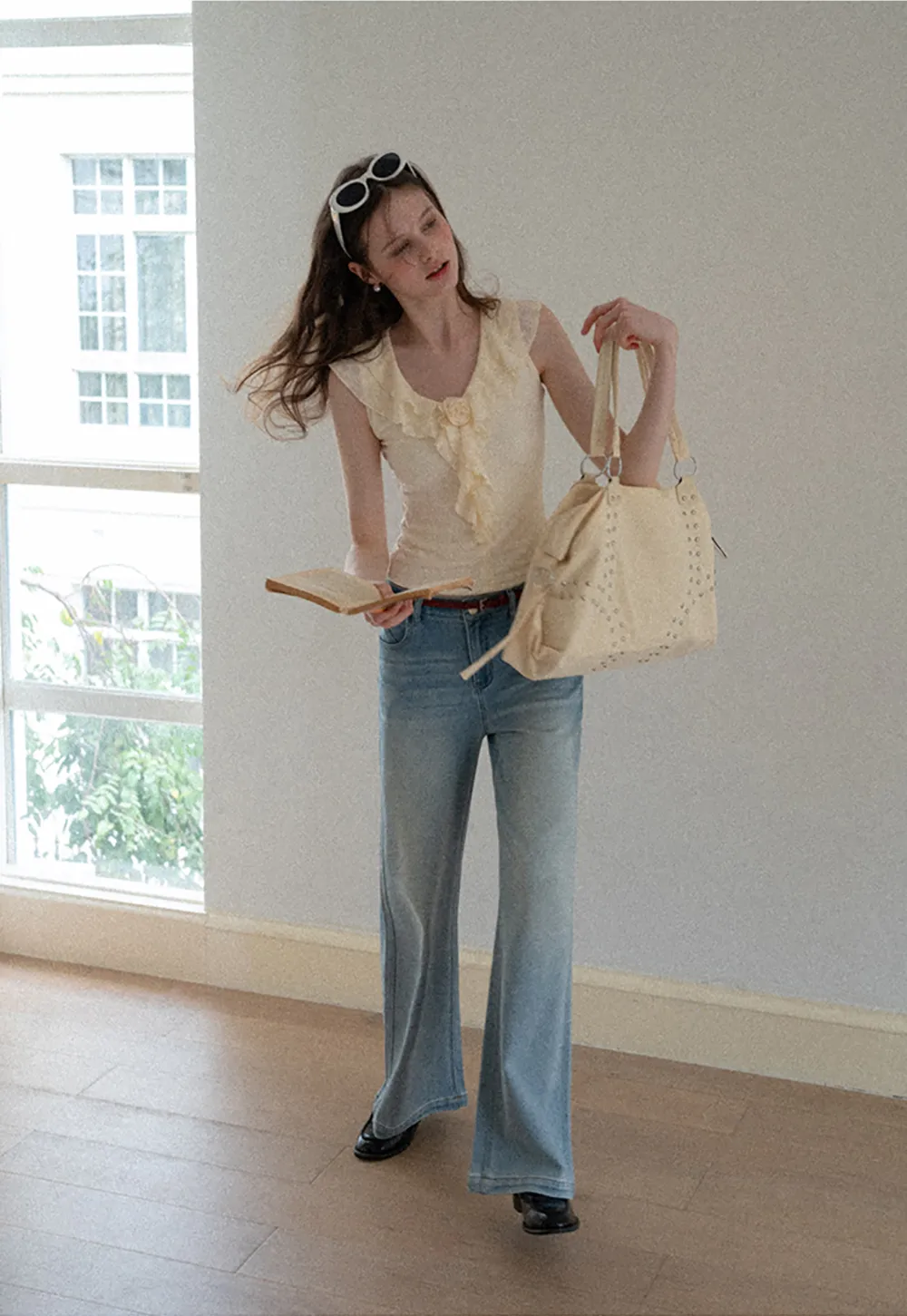 Sleeveless Top with Ruffled V Neck and Floral Detail