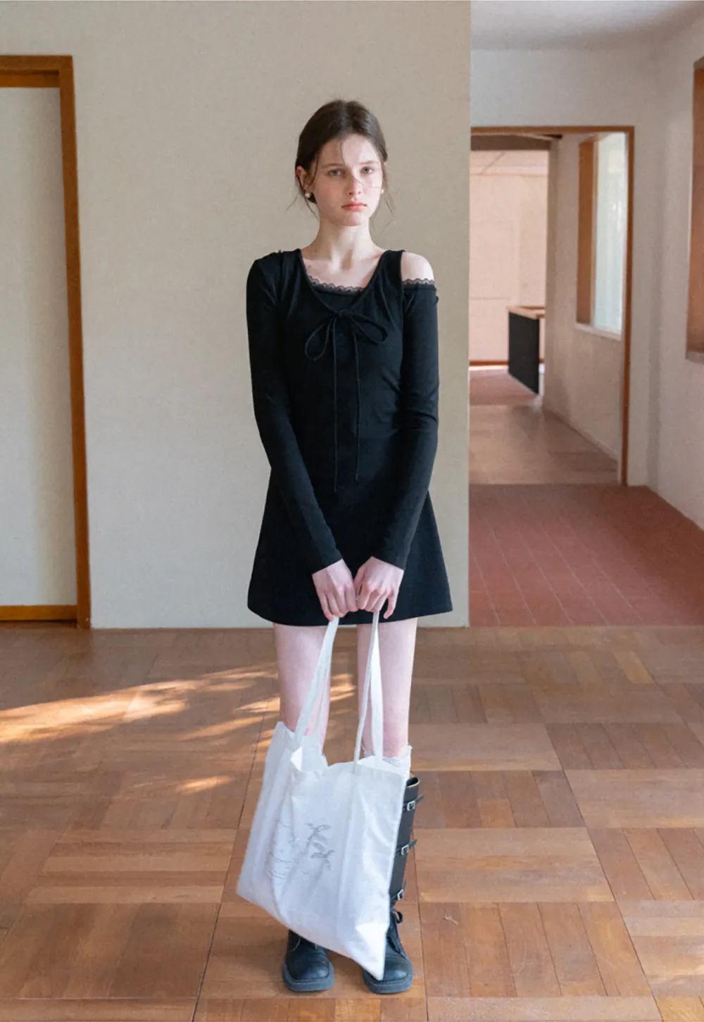 Sleeveless dress with front tie detail and t shirt