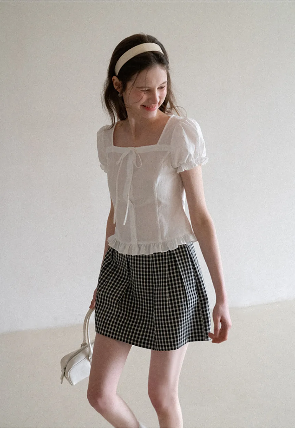 Square neck puff sleeve blouse with ruffle hem