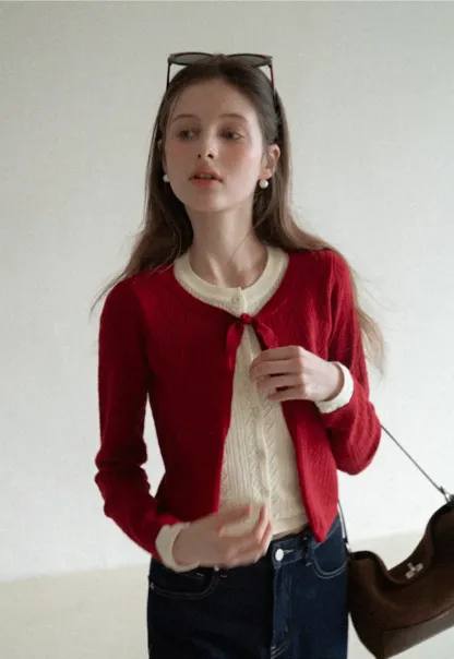 Elegant Knit Cardigan with Bow Detail and Ribbed Texture