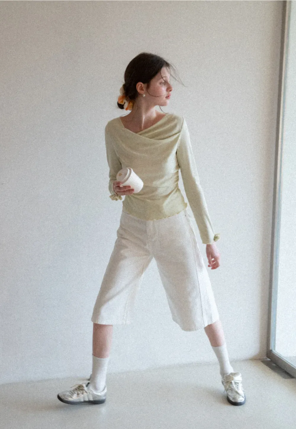 Long sleeve top with ruffled hem and cuffs