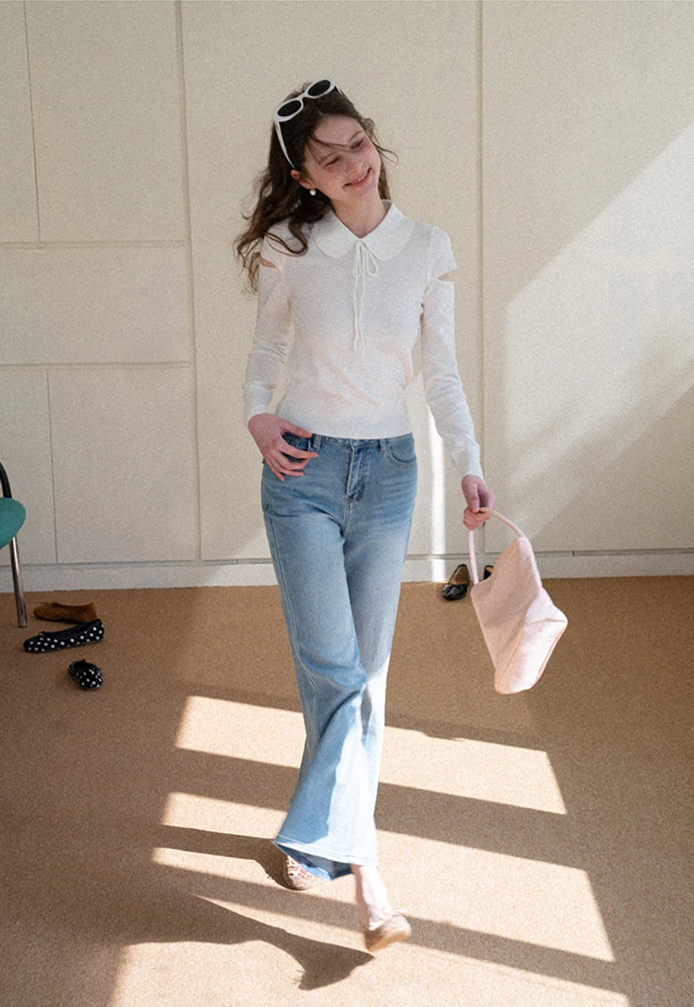 Elegant Knit Sweater with Bow Detail and Cutout Sleeves