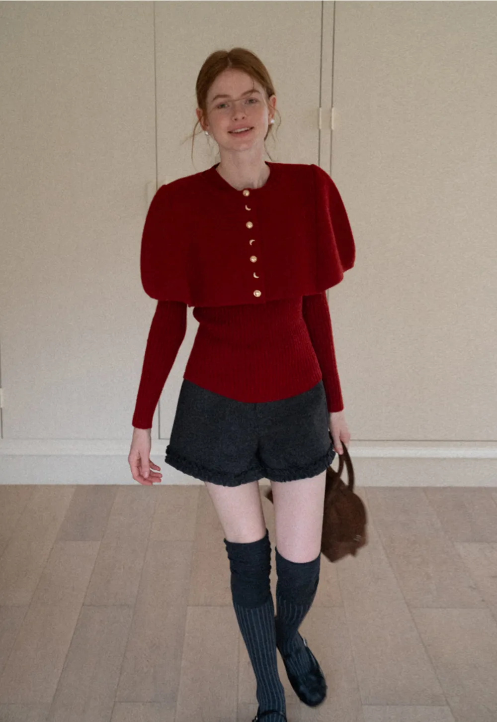 High waist shorts with ruffle hem and belt design