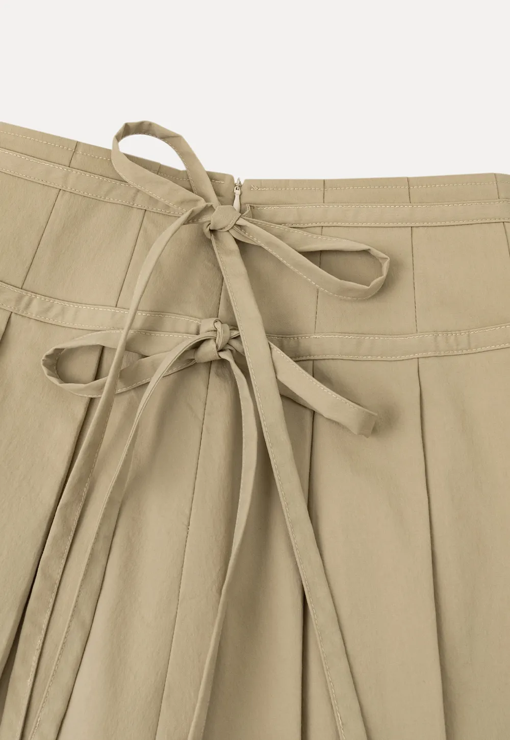 Pleated skirt with side tie waistband