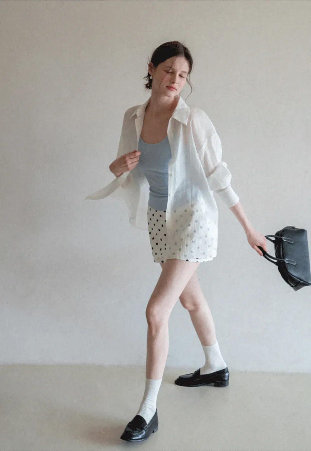 Polka dot mini skirt with layered hem