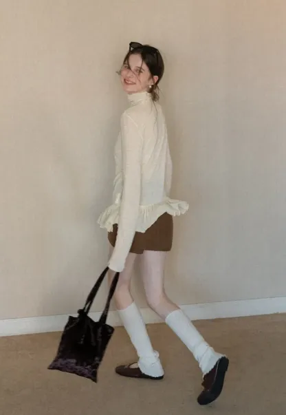 floral dot long sleeve top with ruffle hem