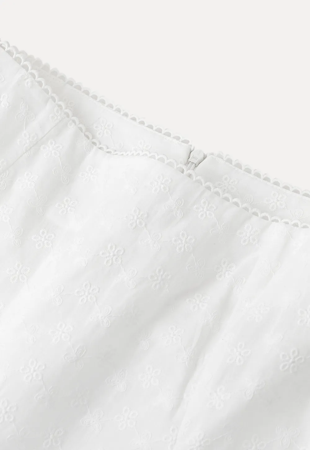 Flared pleated skirt with subtle texture