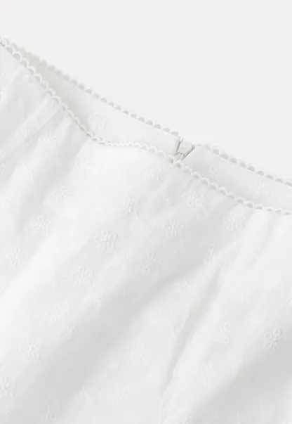 Flared pleated skirt with subtle texture