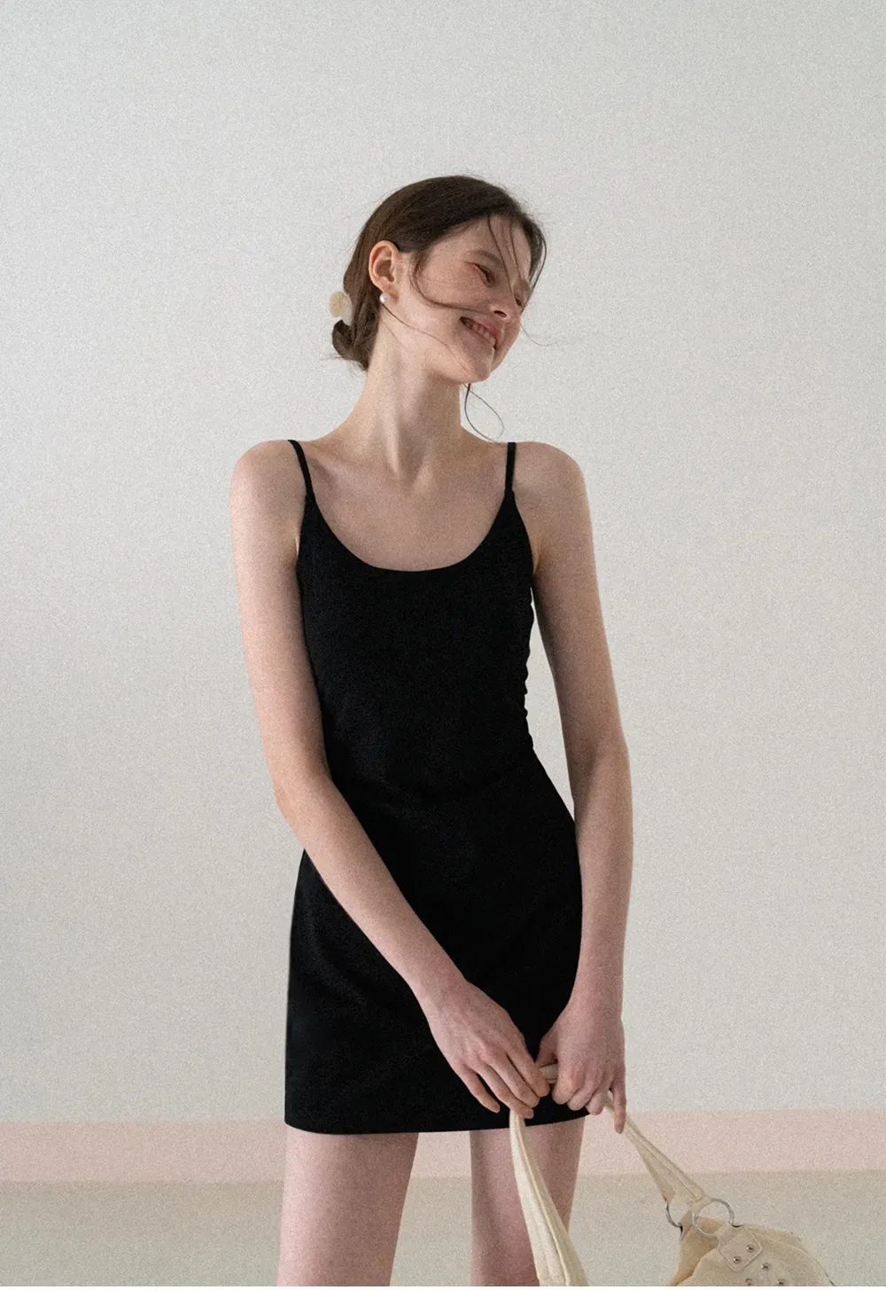 Sleeveless fitted mini dress with thin straps