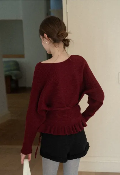 High waist shorts with ruffle hem and belt design