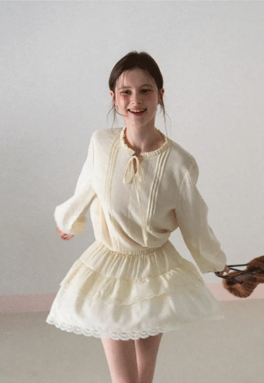 Shirt with ruffled collar and tie front layered skirt