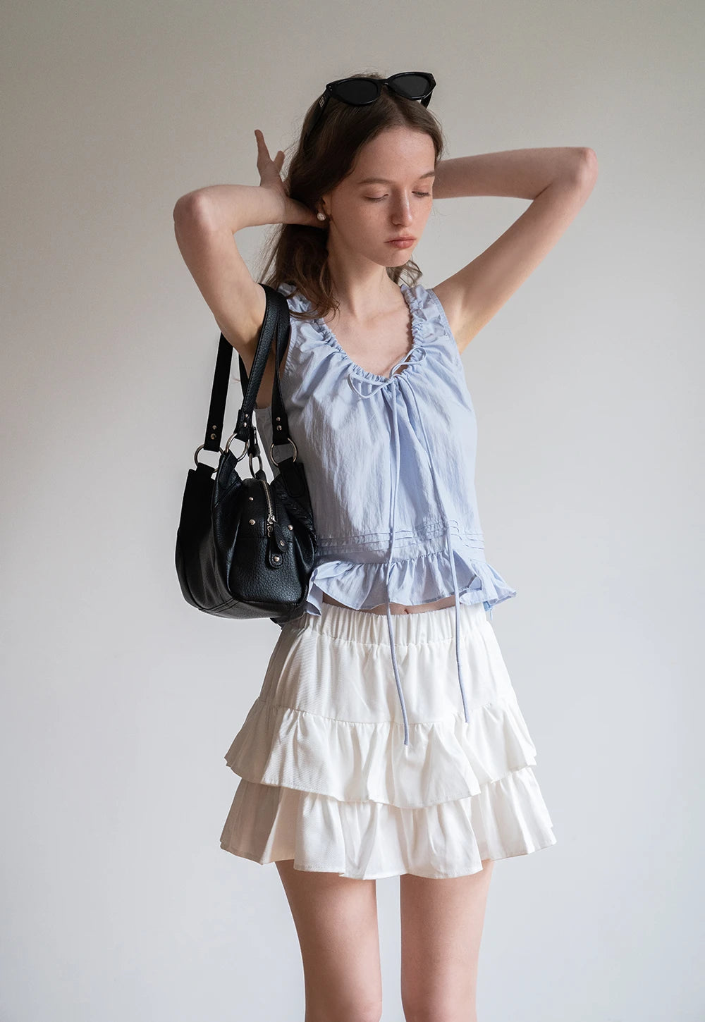 Women's Ruffle Hem Sleeveless Top