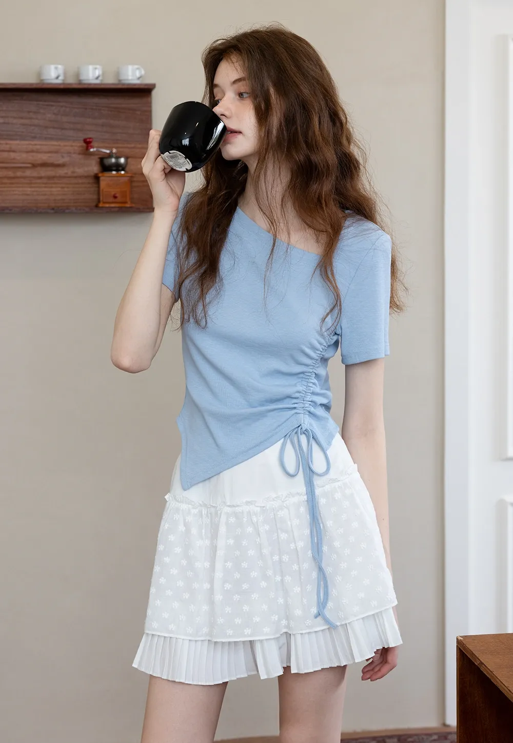 White Pleated Skirt with Floral Details