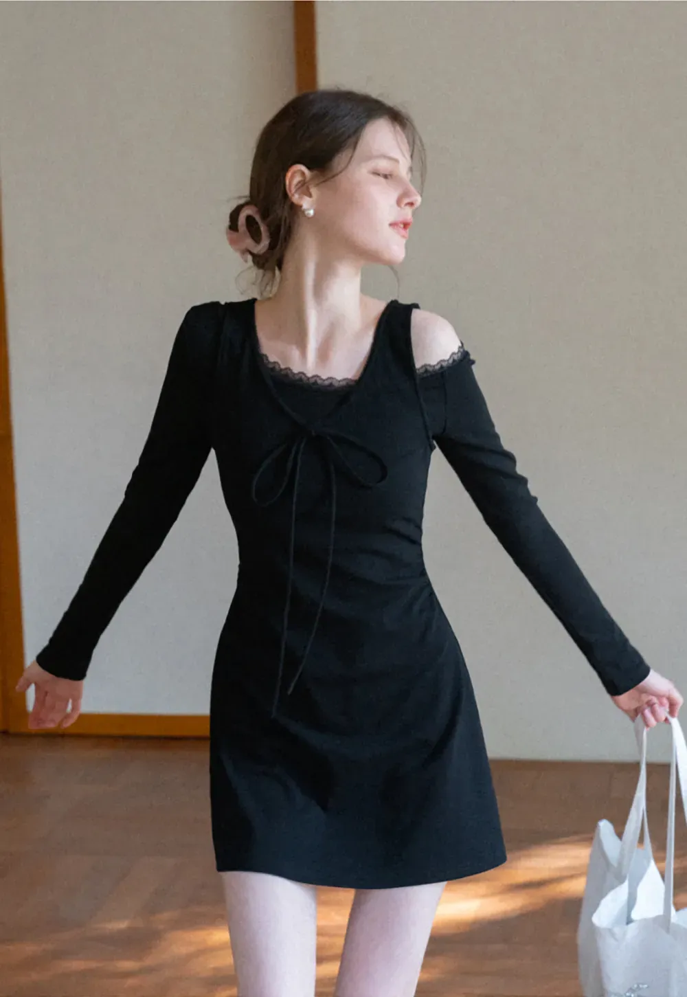 Sleeveless dress with front tie detail and t shirt