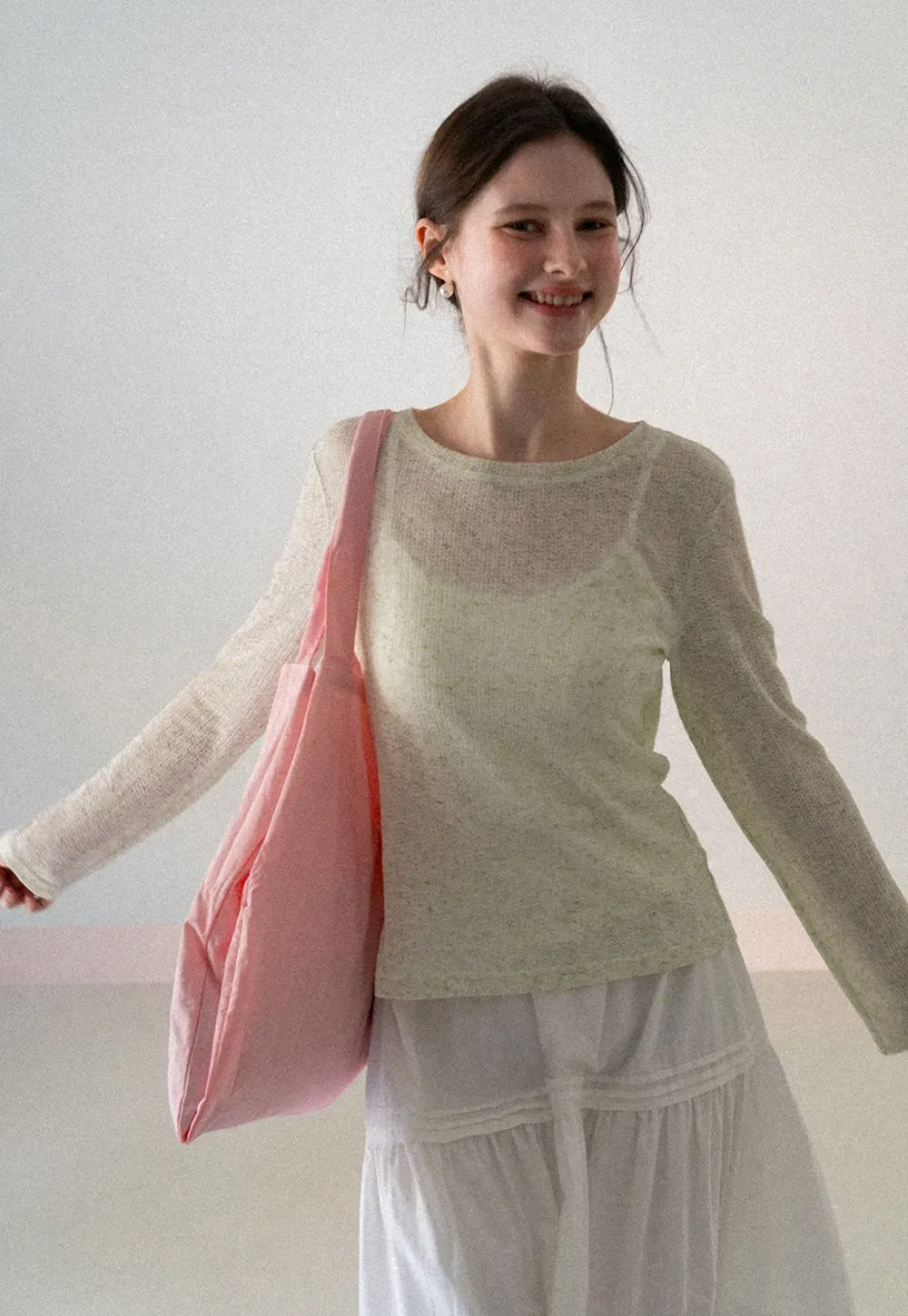 Long sleeve sheer knit top with round neckline