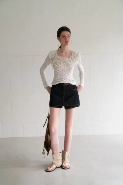 Polka dot long sleeve top with ruffled neckline