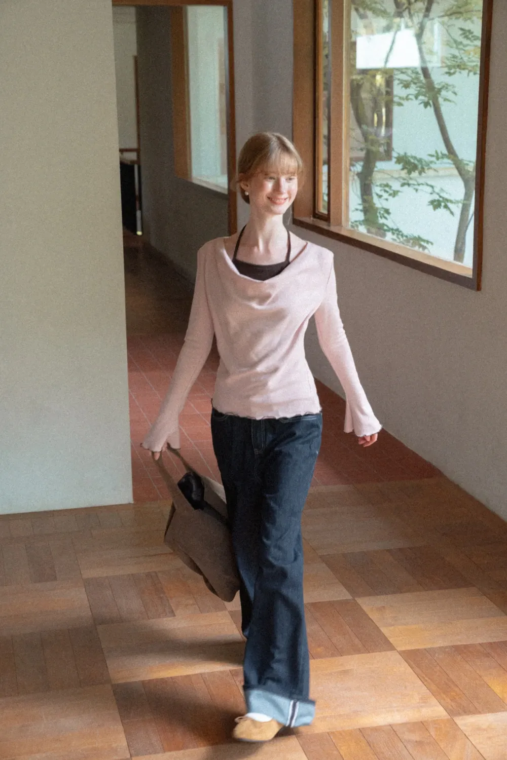Beige Long-Sleeve Top with Ruffled Hem and Bow Tie Back