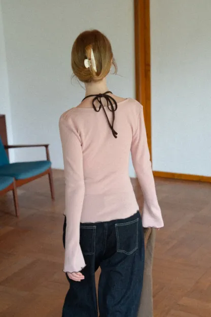 Beige Long-Sleeve Top with Ruffled Hem and Bow Tie Back