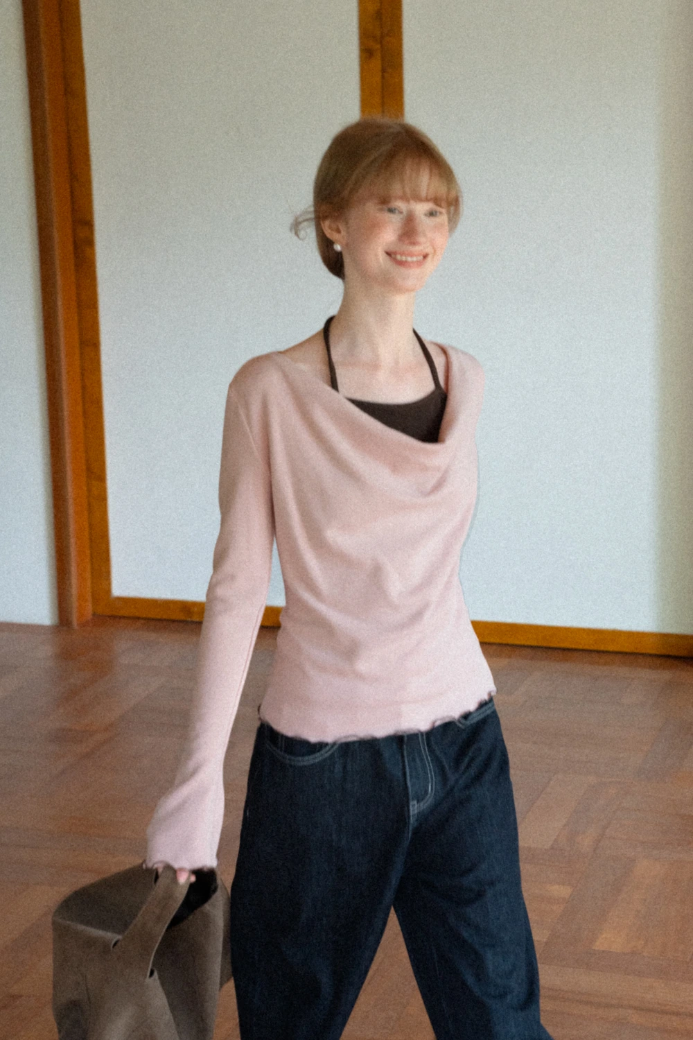 Beige Long-Sleeve Top with Ruffled Hem and Bow Tie Back