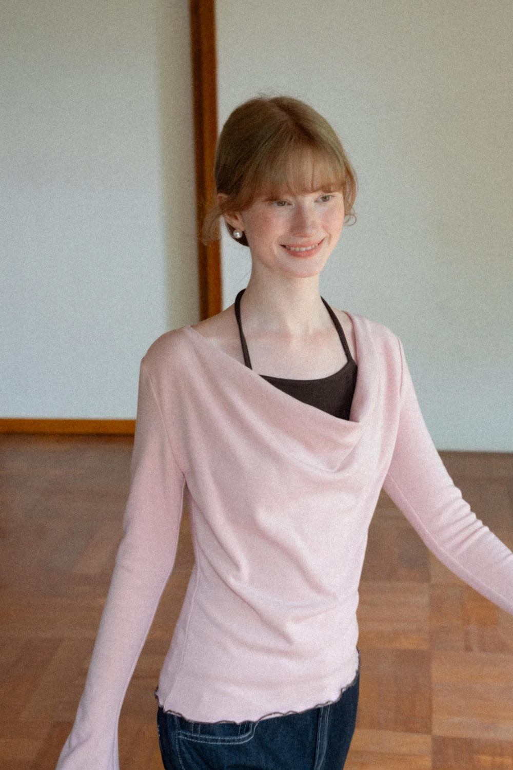 Beige Long-Sleeve Top with Ruffled Hem and Bow Tie Back