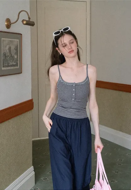 Strapless top with sheer neck tie and loose fit pants