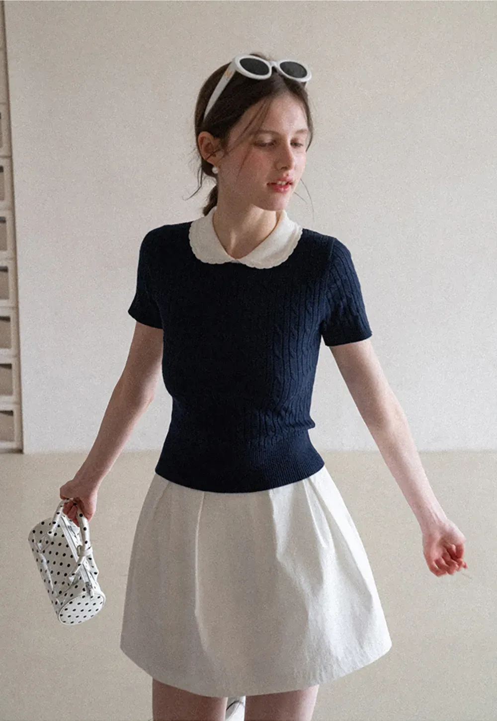 Plaid skirt with pleats and ruffled top