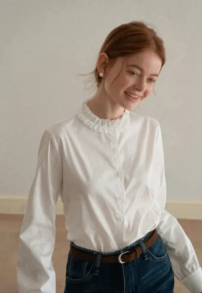 Elegant Blouse with Ruffled Collar and Cuffs
