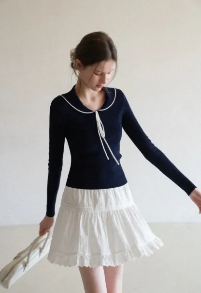 Eyelet Trimmed Tiered Skirt with Ruffled Hem