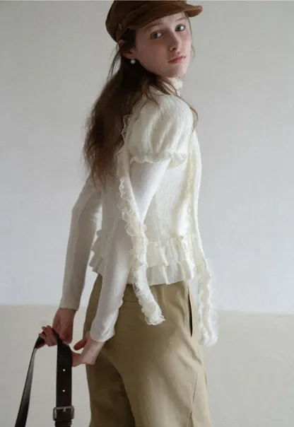 floral lace top with puffed sleeves and ruffled hem